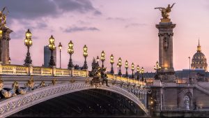 Read more about the article Pont Alexandre III bridge over Seine River at winter evening twilight, Paris, France