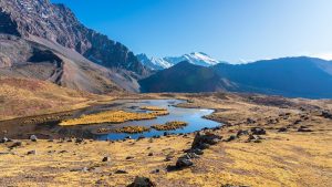 Read more about the article Laguna in Andes with snowcapped Nevado Ausangate mountain, Cuzco, Peru