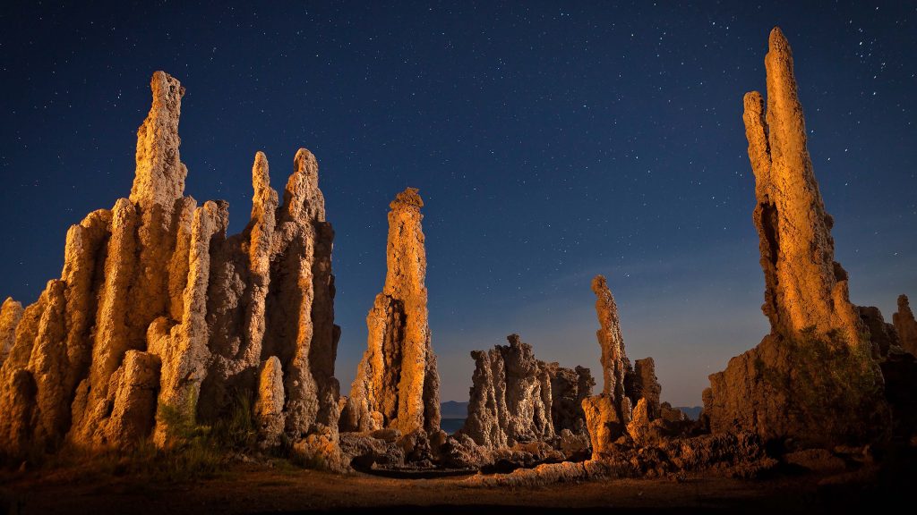 Tufa rock formation at Mono Lake at night with stars in the sky, California, USA