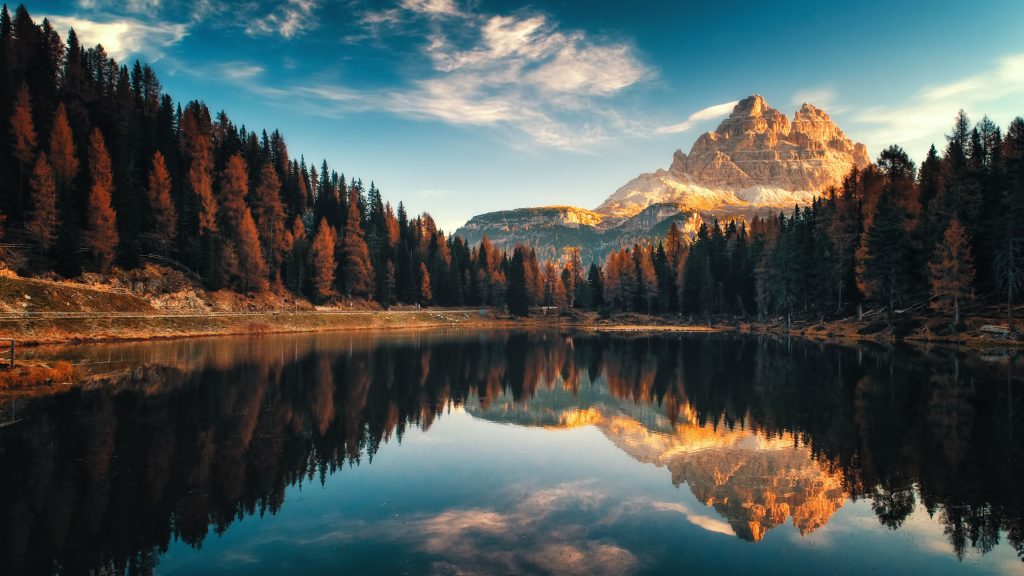 Three Peaks of Lavaredo reflected in Lago Antorno lake in autumn, Belluno, Veneto, Italy