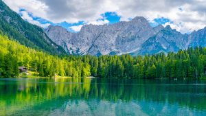 Read more about the article Mangart mountain seen from Fusine Lakes in summer, Friuli Venezia Giulia region, Italy