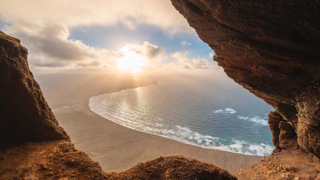 Scenic sunset over Famara beach, Lanzarote, Canary Islands, Spain