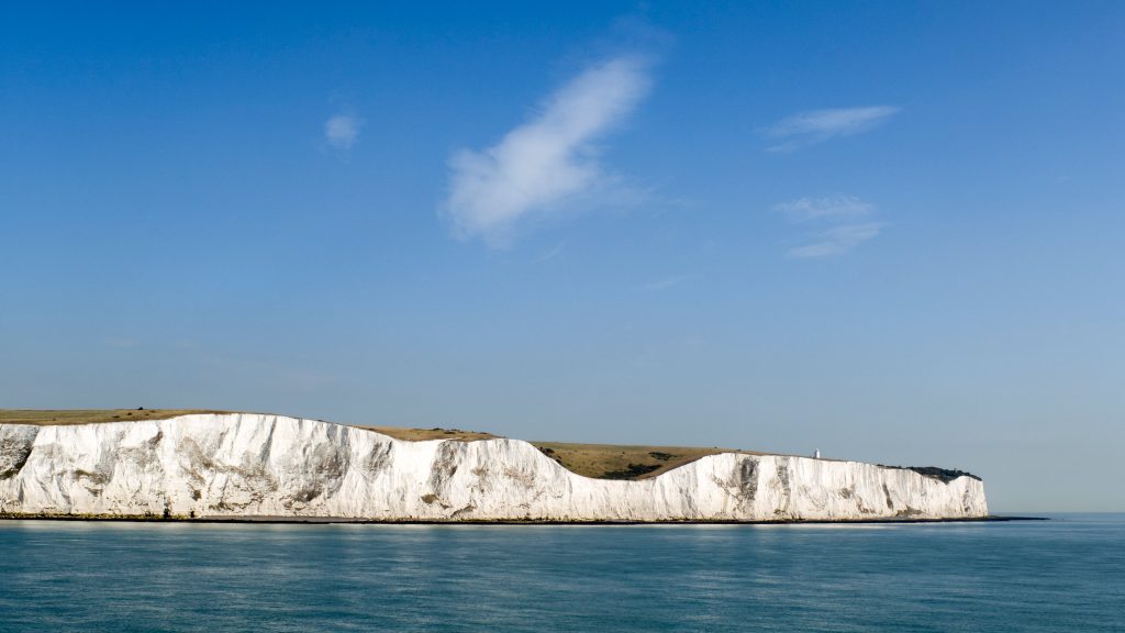 White Cliffs of Dover with a lighttower, Kent, England, UK