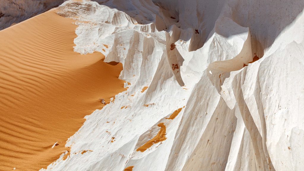 Limestone and sand dune in White Desert National Park near Farafra oasis, Egypt