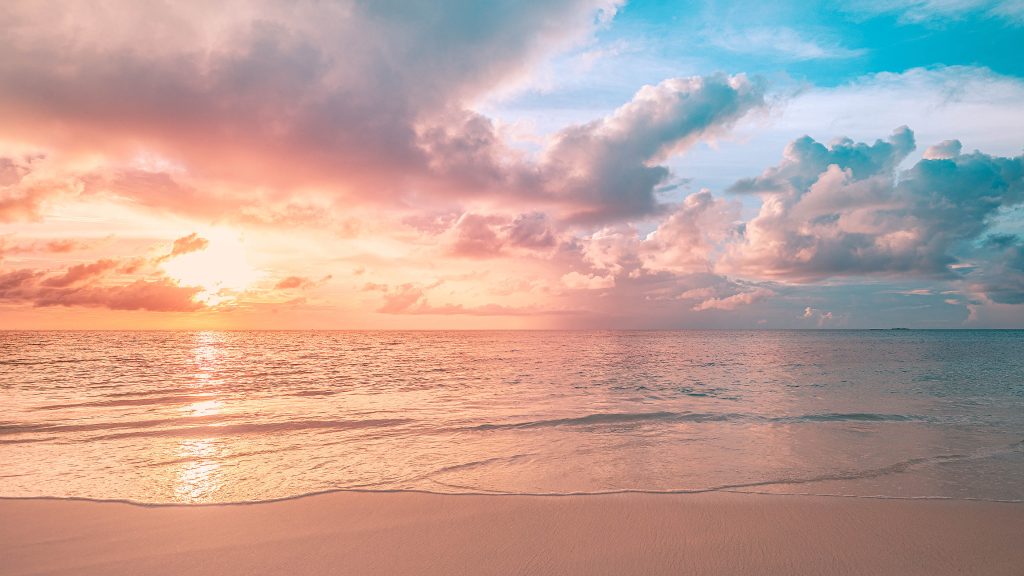 Sea sand beach landscape panorama view at summer sunset, Maldives