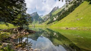 Read more about the article Clouds over mountains with reflection in lake, Appenzell Innerrhoden, Switzerland