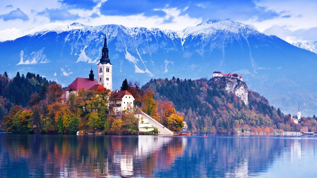 Bled with lake, island, castle and mountains in background, Slovenia