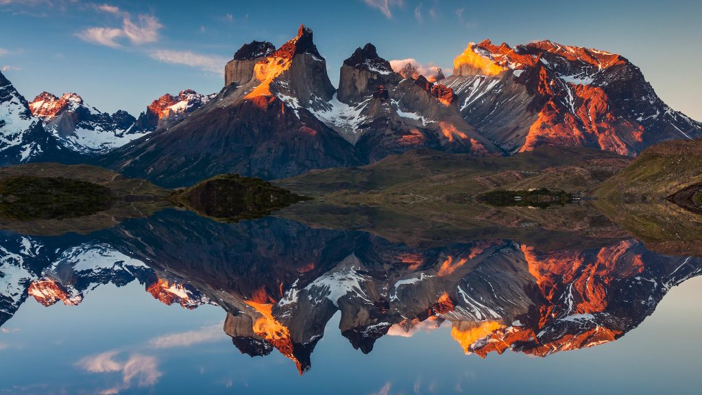Sunset reflecting on water, Cuernos del Paine in Torres del Paine National Park, Chile