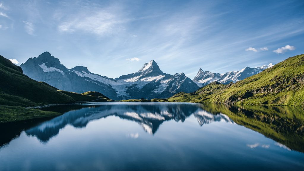Schreckhorn mountain reflected in Bachalpsee lake, Swiss Alps, Grindelwald, Switzerland