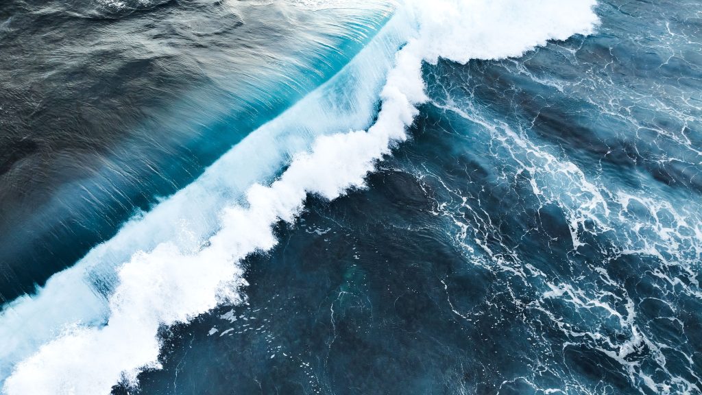 Plunging ocean wave at Uluwatu, Bali, Indonesia