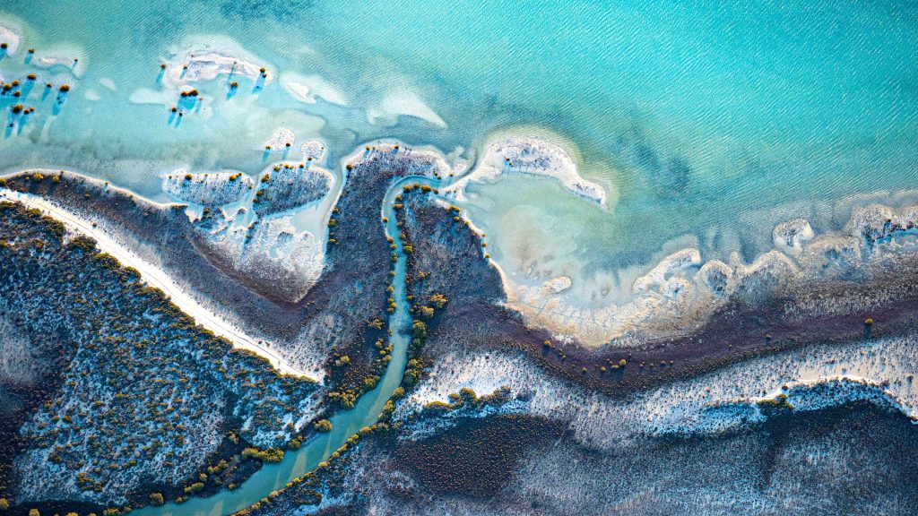Aerial view of tidal dunes and water inlet in Shark Bay, Western Australia
