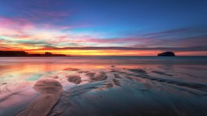 Read more about the article Bass Rock and Tantallon Castle view at sunset from Seacliff beach, Scotland, UK