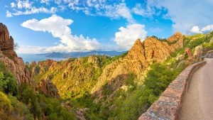 Read more about the article Landscape with mountain road through the Calanches de Piana in Corsica, France