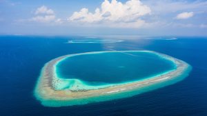 Read more about the article Aerial view of few atolls surrounded by Indian Ocean, Maldive Islands archipelago