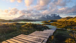 Read more about the article Boardwalks at Lake Pehoe in Torres del Paine National Park at sunset, Patagonia, Chile