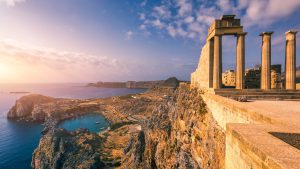 Read more about the article View of Temple of Athena Lindia with St Paul’s bay in Lindos, Rhodes, Greece