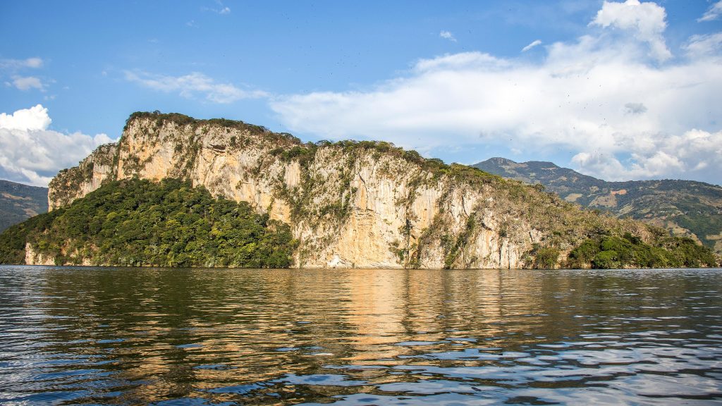 View of Sumidero Canyon and Grijalva River against cloudy sky in Chiapas, Mexico