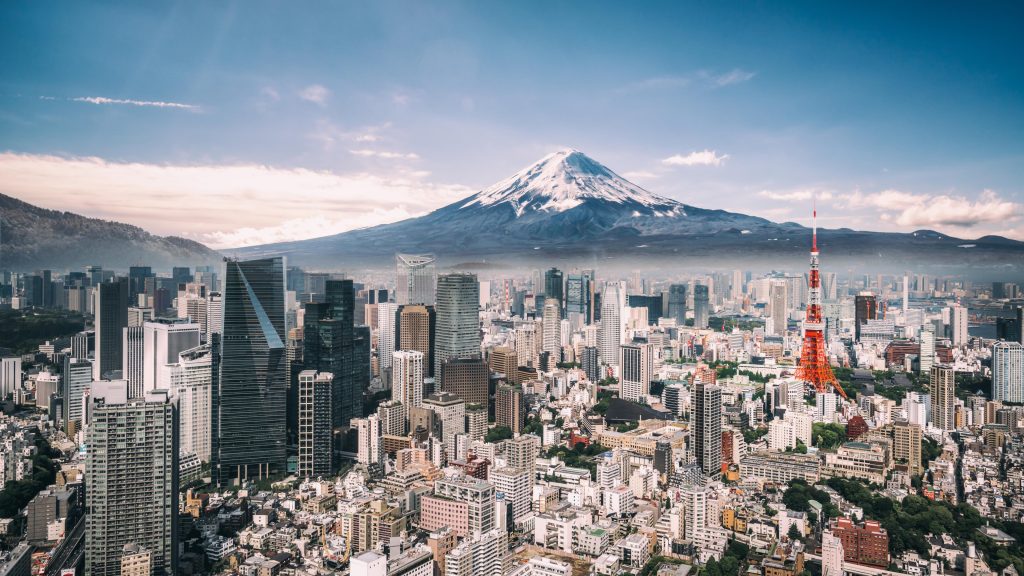 View of Mount Fuji, Tokyo Tower and crowded buildings in downtown, Japan