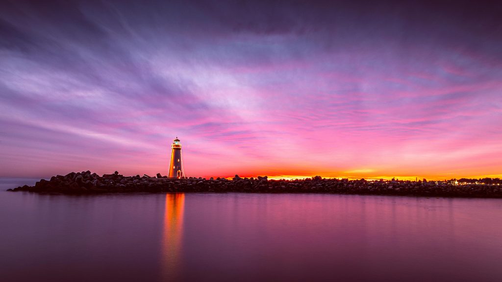 Sunset at Santa Cruz Breakwater Light (Walton Lighthouse), California, USA